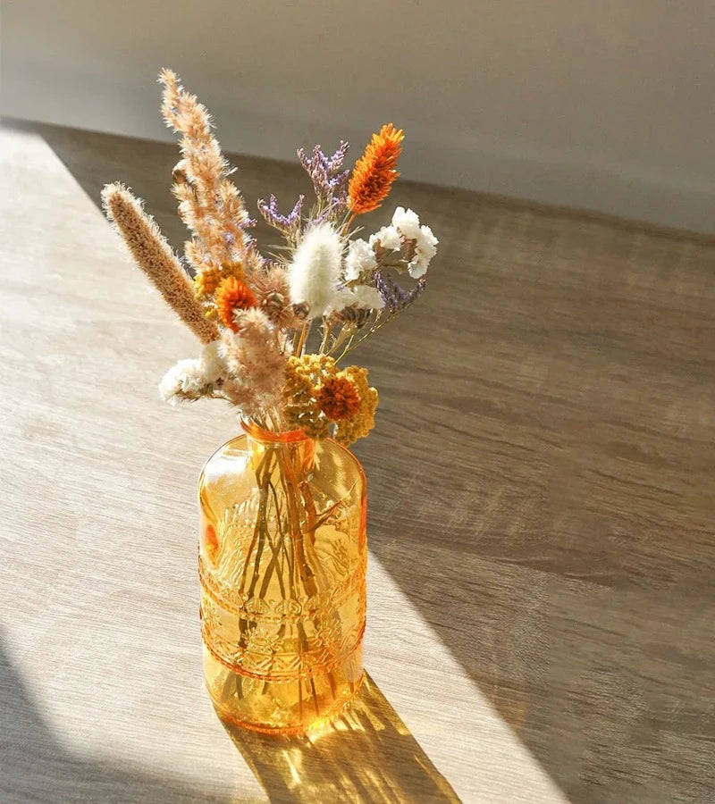 Vase fleuri jaune