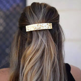 barrette orelia dorée portée